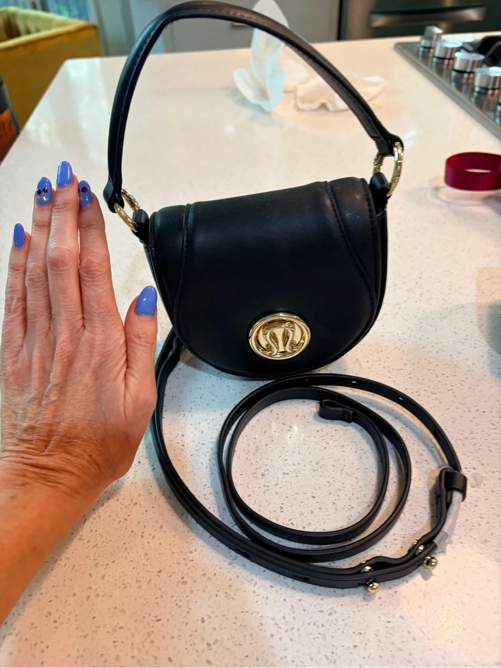 lululemon athletica Black Leather Crossbody with Gold Logo Accent